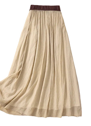 Women's pleated A-line midi skirt with elastic waistband

White viscose pleated midi skirt for women

Purple retro-inspired women's A-line skirt

Khaki pleated mid-length skirt for women

Green women's midi skirt with flowing A-line silhouette

Women's solid-color skirt with vintage pleated design

Women's elastic-waist midi skirt in multiple colors