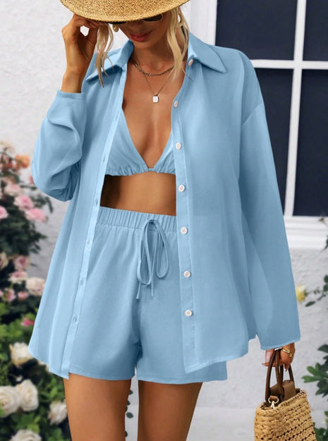 Conjunto de tres piezas de camisa transparente de manga larga, pantalón corto y sujetador