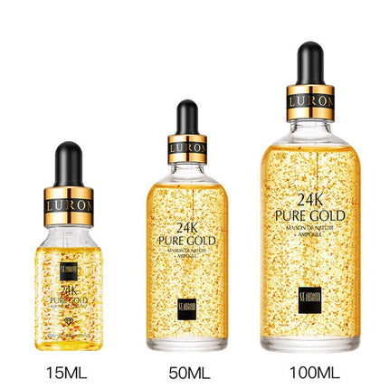 Three bottles of Luron 24K Pure Gold Ampoule in different sizes on a white background.
