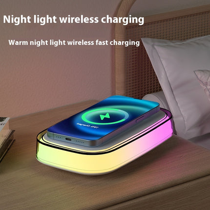 Wireless charging pad with night light feature on a bedside table.