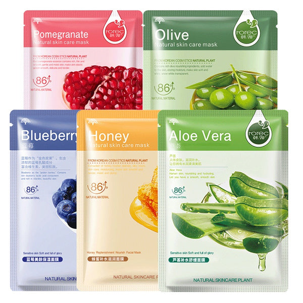 Five skin care mask packages with different ingredients on a white background