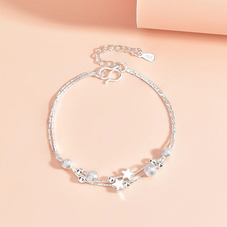 Pulsera de estrella de círculos dobles