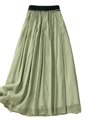 Women's pleated A-line midi skirt with elastic waistband

White viscose pleated midi skirt for women

Purple retro-inspired women's A-line skirt

Khaki pleated mid-length skirt for women

Green women's midi skirt with flowing A-line silhouette

Women's solid-color skirt with vintage pleated design

Women's elastic-waist midi skirt in multiple colors