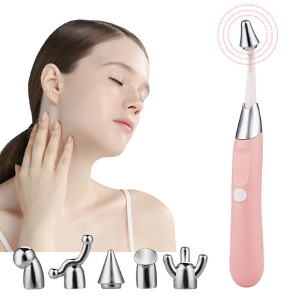 Pink skin care tool with interchangeable heads on a white background