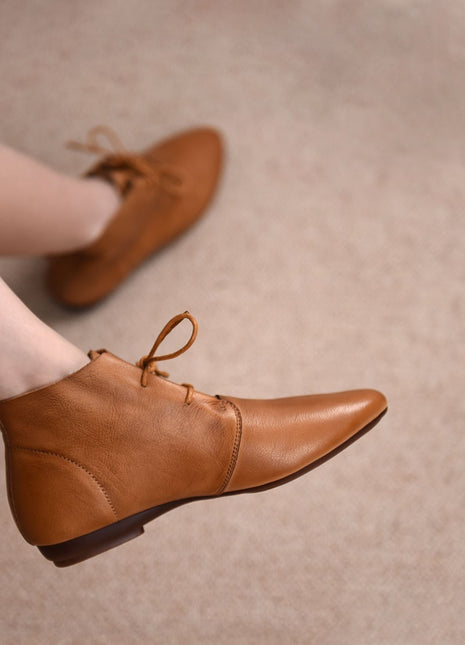 Botines planos versátiles de cuero suave y cómodo