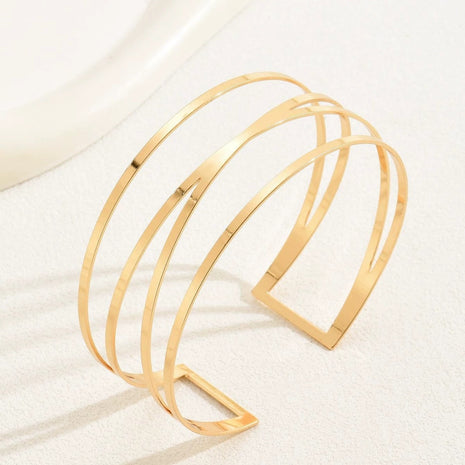 Pulsera de brazo con líneas bañadas en oro hecha a mano