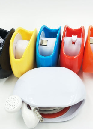 Set of colorful tape dispensers on a white background