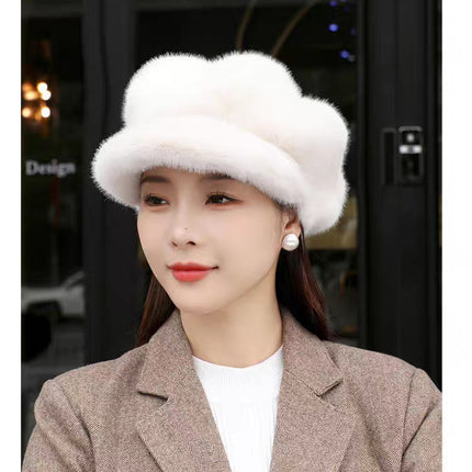 Woman wearing a white fur hat indoors with blurred background
