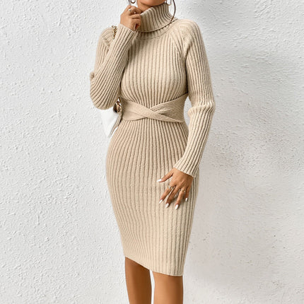 Beige ribbed knit dress with a belt against a white background