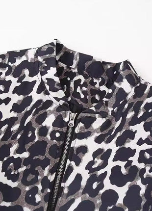 Women's distressed leopard print jacket coat

Leopard print streetwear jacket with irregular fit

Women's animal print coat with distressed detailing

Long-sleeve leopard jacket for casual streetwear outfits

Women's leopard print outerwear styled with denim

Distressed animal print jacket for edgy everyday fashion

BLNDL women's leopard print statement jacket