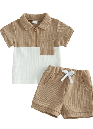 Children's clothing set with a polo shirt and shorts on a white background