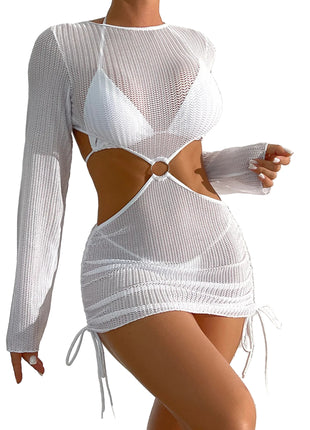 White mesh dress with cut-out design on a plain background