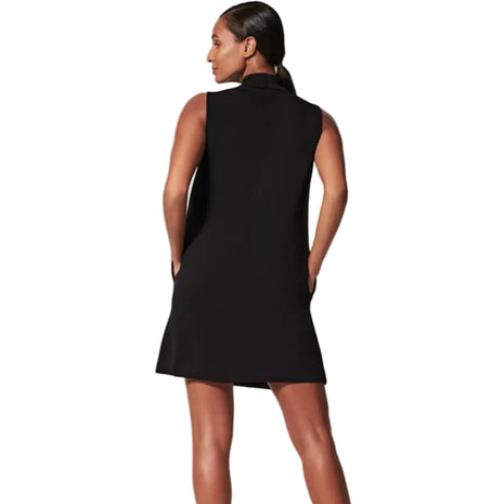Black slim midi dress for women with high neckline and minimalist street fashion style.