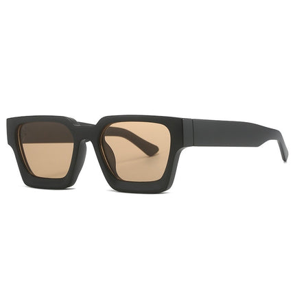 Black sunglasses with brown lenses on a white background