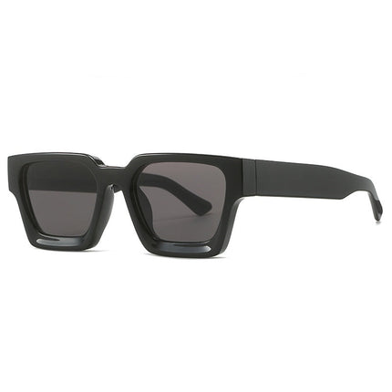 Black sunglasses with dark lenses on a white background