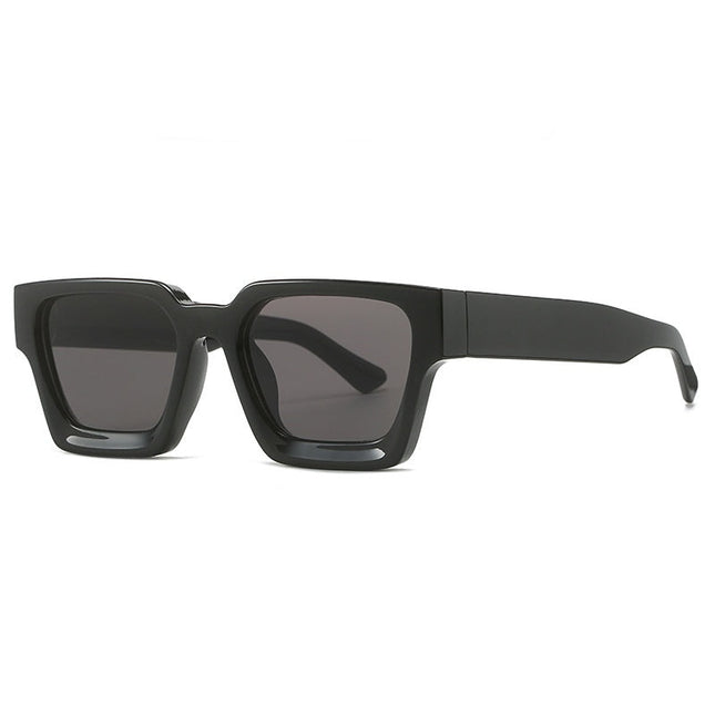 Black sunglasses with dark lenses on a white background