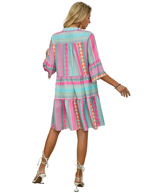 Bohemian summer dress with light blue, pink, beige, and orange mixed color pattern.