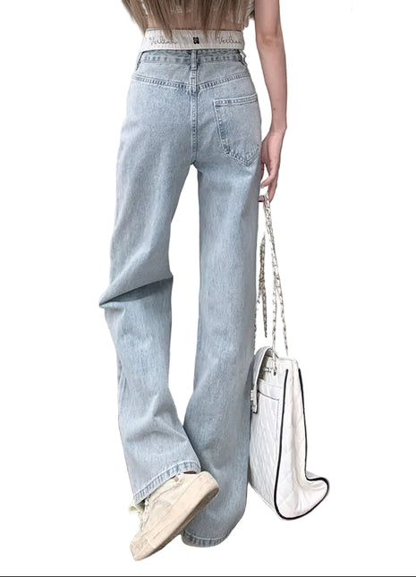 Casual women’s denim jeans with high waist fit, button accents, and versatile everyday styling.