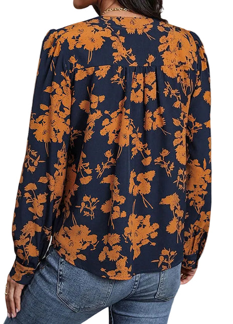 Casual pullover top with a botanical leaf pattern, straight fit, and lightweight polyester construction.