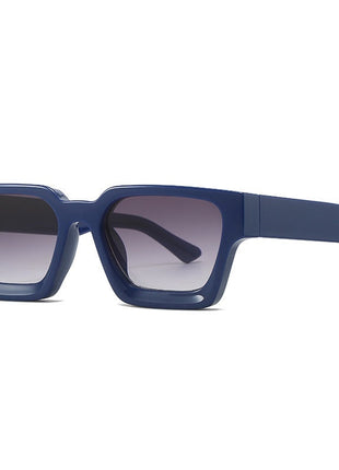 Blue sunglasses with a white background