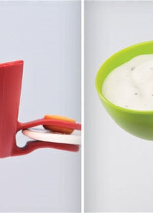 Two silicone cups, one red and one green, on a white background.