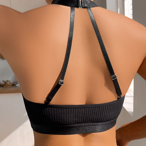 Comfortable black nylon vest-style bra featuring a 3/4 cup design and soft cotton lining.
