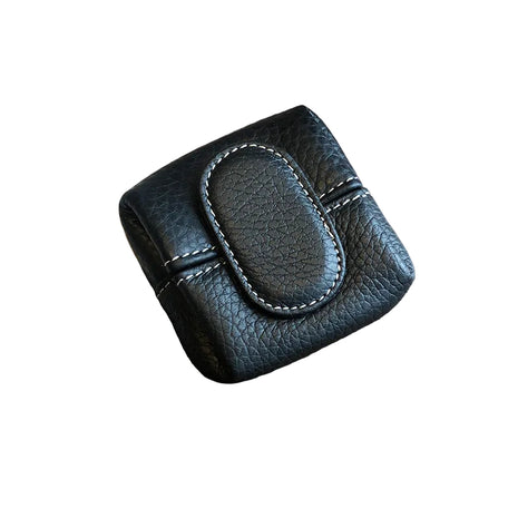 Compact first layer cowhide leather mini purse for coins, keys, and small essentials.