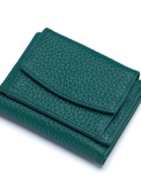Compact women's cowhide wallet with magnetic buckle, card slots, and coin pocket.