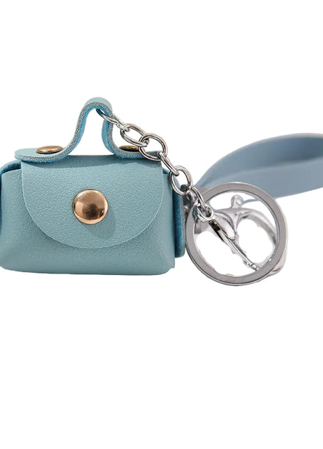 Cute small PU leather coin wallet with attached keychain for bags and keys.