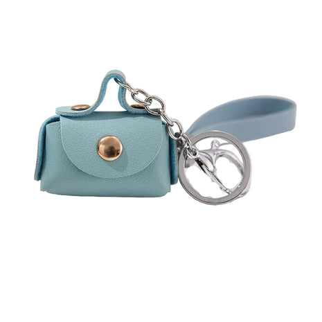 Cute small PU leather coin wallet with attached keychain for bags and keys.