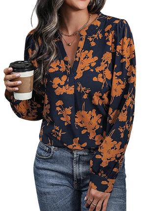 Dark blue V-neck shirt with orange leaf print, soft polyester fabric, and a comfortable straight silhouette.