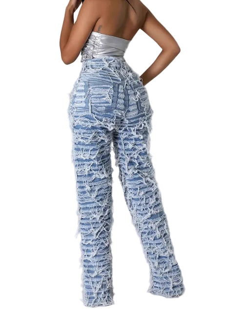 Loose fit women’s denim pants featuring ripped details, tassel edging, and comfortable cotton fabric.