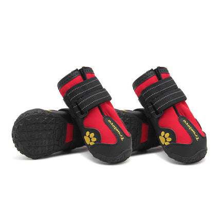 Red and black dog boots with yellow paw design on a white background