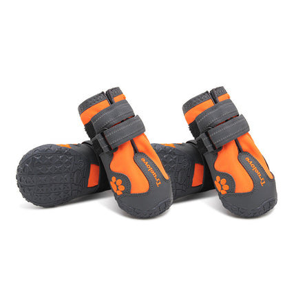 Orange and gray dog boots with brand logo on a white background