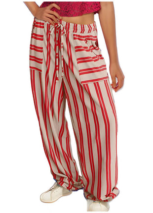 Red and white striped pants worn by a person on a white background blndl