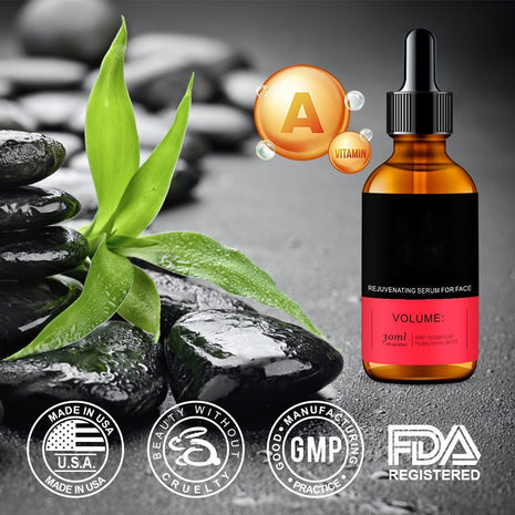 Serum bottle with green leaves and stones on a dark background, featuring certifications.