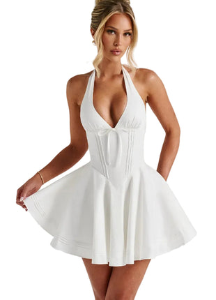 Elegant white party dress with A-line skirt, solid color style, and feminine socialite fashion look.