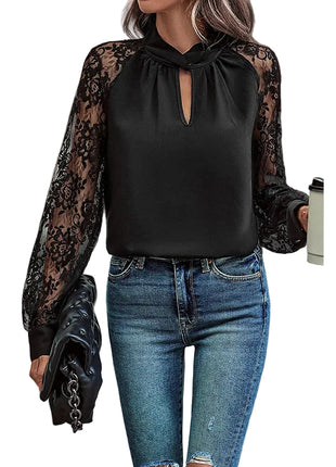Elegant black office blouse with delicate lace detailing and long sleeves for business casual styling.