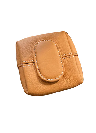 Elegant cowhide mini organizer designed for everyday storage and handbag organization.