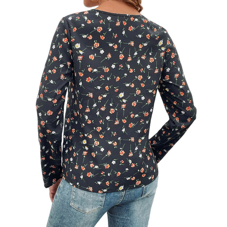 Elegant floral print blouse featuring long sleeves, a classic crew neckline, and lightweight polyester fabric.