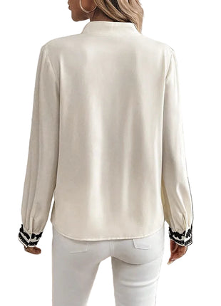Elegant women's long sleeve casual blouse with single-row buttons and a regular-fit silhouette.
