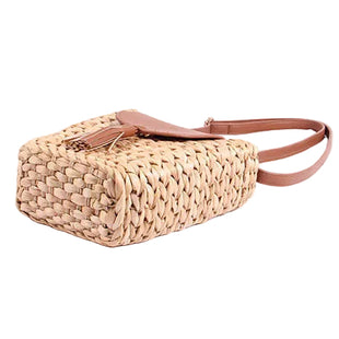 Fashionable trapezoid women's shoulder bag with artistic woven design, secure zipper buckle closure, and comfortable shoulder strap.