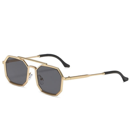 Gold-framed sunglasses with black lenses on a white background