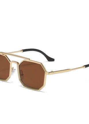 Gold-framed sunglasses with brown lenses on a white background