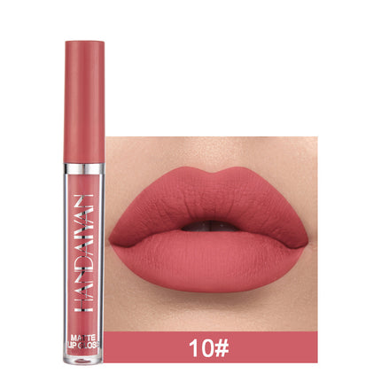 A swatch of a liquid lipstick in a dark red shade, with the product's packaging indicating the shade as '01#'.