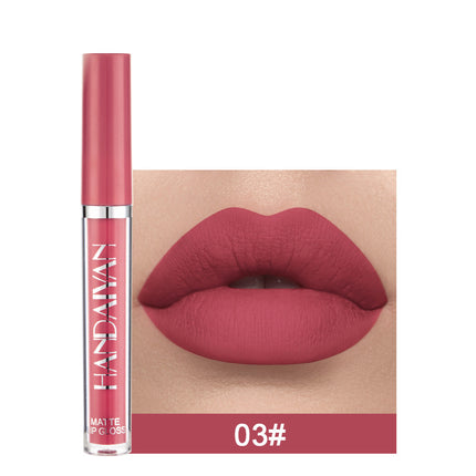 A swatch of a liquid lipstick in a dark red shade, with the product's packaging indicating the shade as '01#'.