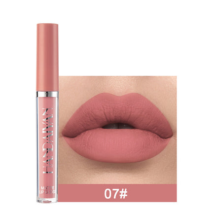 A swatch of a liquid lipstick in a dark red shade, with the product's packaging indicating the shade as '01#'.