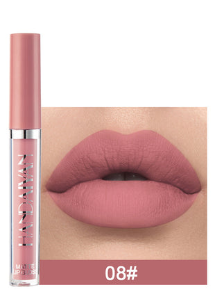 A swatch of a liquid lipstick in a dark red shade, with the product's packaging indicating the shade as '01#'.