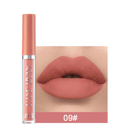 A swatch of a liquid lipstick in a dark red shade, with the product's packaging indicating the shade as '01#'.
