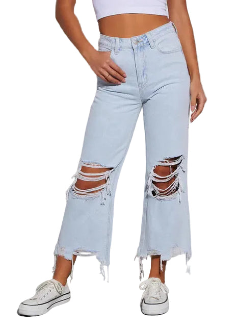 Women’s commuter style ripped jeans with cotton denim fabric and trendy cropped silhouette.